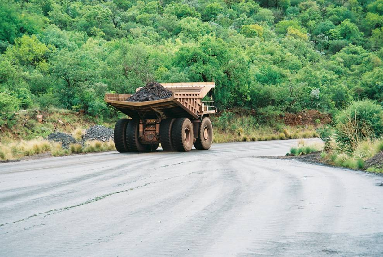 T-PRO® stabilized Chilean iron ore mine haul road — Caterpillar 785B haul truck on treated surface